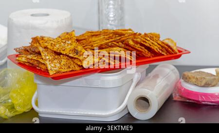 Spiced Triangular Crackers Fried Tortilla Chips Seasoned Lavash at Tray Stock Photo