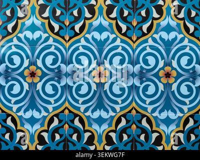 Full frame view of vibrant blue ceramic tiles featuring intricate geometric and floral Middle Eastern designs. Ideal background pattern for luxury, in Stock Photo