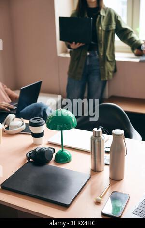 Wireless technologies with office supplies kept on table Stock Photo