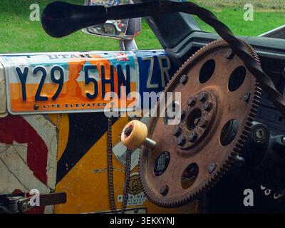 Unique Rat Rod interior with an industrial gear steering wheel Stock Photo