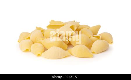 Raw conchiglioni pasta isolated. Dry conchiglie noodle in shell shape, big Italian macaroni, durum wheat pasta on white background Stock Photo