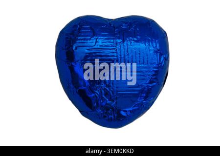 single heart shaped chocolate in blue foil wrapper isolated on white background - foil wrapped Stock Photo