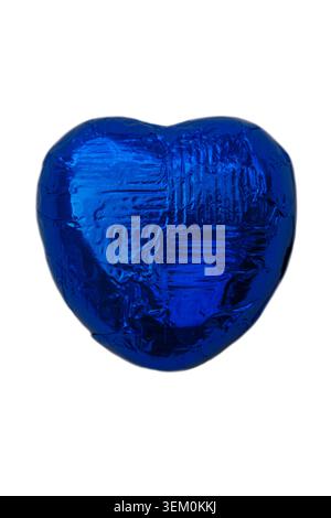 single heart shaped chocolate in blue foil wrapper isolated on white background - foil wrapped Stock Photo