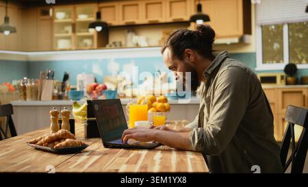 Adult man interacting with AI assistant to generate photos from text description, concept focuses on artificial intelligence and real-time responses supporting productivity. Automation at home. Stock Photo
