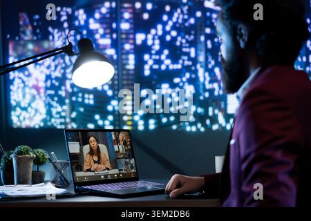 Economic director meets with financial team on videocall link to increase company budget, sharing suggestions in a briefing session online. CFO and employees working on expansion strategy. Stock Photo