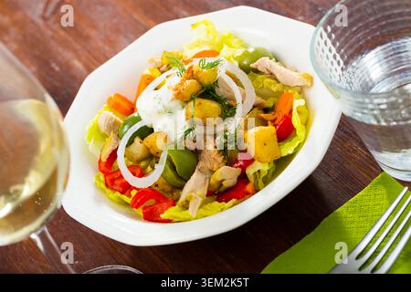Warm salad with chicken and eggplant Stock Photo