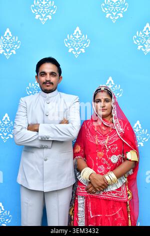 Rajasthani or North Indian husband and wife dressed in elegant festive clothing Stock Photo