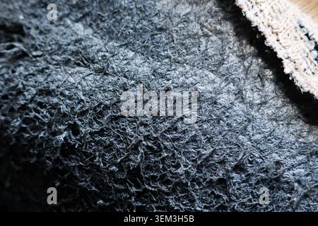 Texture background rough fiber dark grey fabric macro pattern raw surface creates calm mysterious feeling highlighting detailed interlaced materials f Stock Photo