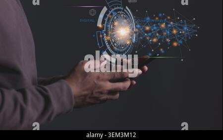 Young man hand uses smartphone touching technology circle, Digital Connectivity, World of communication via modern networks and online systems via the Stock Photo
