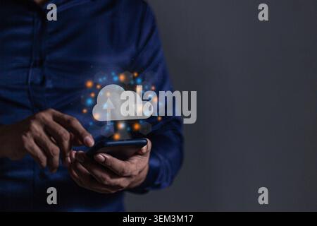 Young man with smartphone mobile hand touching to cloud computing diagram, Data storage, Cloud technology, Cloud Computing Storage Stock Photo