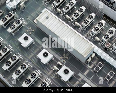 Aerial view of industrial cooling systems and HVAC units on the rooftop of the AI data center in Warsaw, Mazowieckie, Poland. Stock Photo