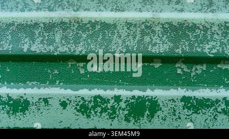 Green Weathered Metal Background with White Paint Marks Stock Photo