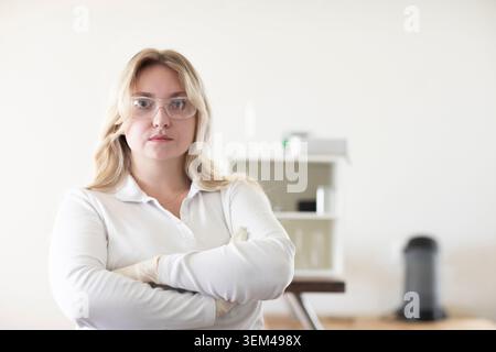 Scientist female with blonde hair working in a labor Stock Photo