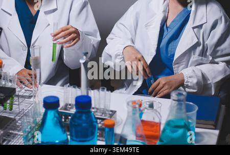 Researchers working in the clinical laboratory Stock Photo