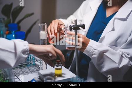 Researchers working in the clinical laboratory Stock Photo