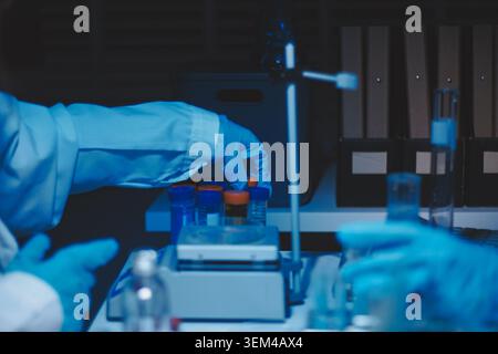 Researchers working in the clinical laboratory Stock Photo