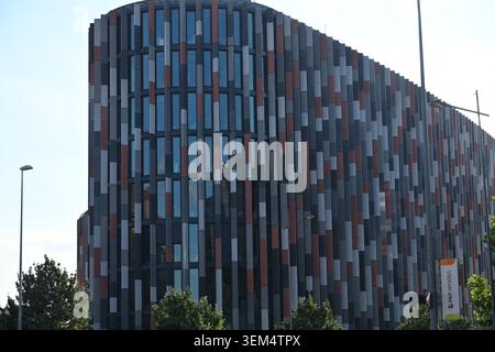 Modern Office Building Facade with Vertical Colorful Decorative Elements Stock Photo