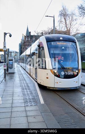 Edinburgh, Scotland, UK - January 19 2026: Edinburgh tram train at St. Anne’s Square station platform, providing public transport for commuters Stock Photo