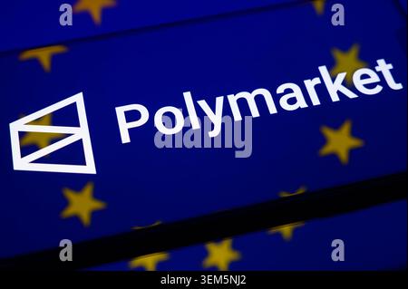 Paris, France - 5 June 2026: Polymarket logo on a smartphone screen with EU flag. Stock Photo