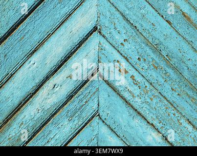 Triangle wooden pattern. Old, weathered, scratched boards. Blue painted planks Stock Photo
