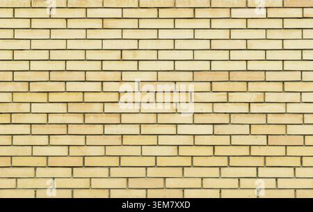 Yellow brick wall, brickwork texture, background Stock Photo