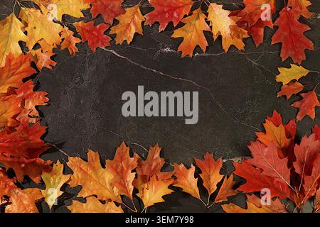 Frame with maple leaves on marble background, autumn abstract composition, Thanksgiving concepts, seasonal background, greeting card or invitation, ba Stock Photo