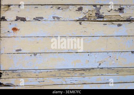 Weathered Peeling Paint on Rustic Wooden Wall Texture Background Stock Photo