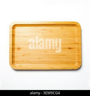 A rectangular eco-friendly bamboo tray captured from a flat lay overhead perspective on a clean white studio setup Stock Photo