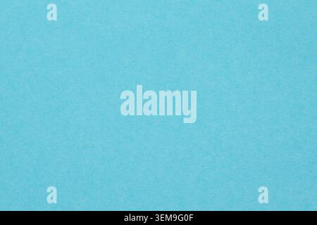 Light blue paper texture background with subtle grain for design projects Stock Photo