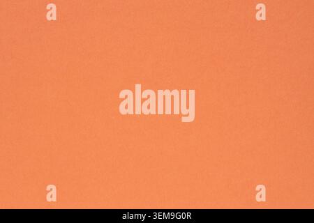 Orange textured paper background with smooth surface for minimalist design Stock Photo