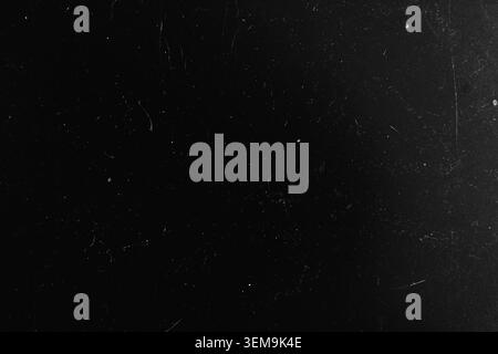 Black vintage film overlay texture with heavy white dust particles scratches and realistic grunge noise Stock Photo