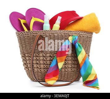 Knitted bag with beach accessories isolated on white Stock Photo