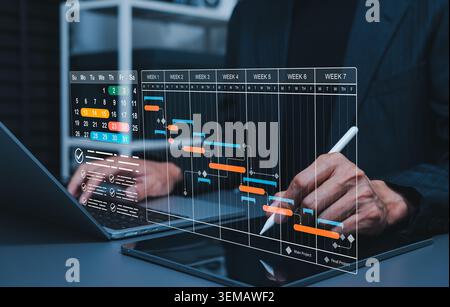 Project schedule planning and Gantt chart management concept. Businessman using tablet, calendar timeline, task checklist, weekly milestones, workflow Stock Photo