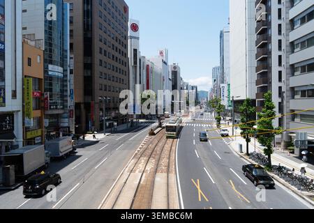 Hiroshima, Japan - May 25, 2026: Cars and buses going through the streets of Downtown Hiroshima, Japan Stock Photo