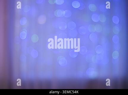 Close-up of an abstract background with bokeh lights in blue, purple, and pink hues. The soft blur creates a smooth and elegant feel, ideal for creati Stock Photo