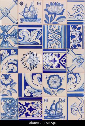 Traditional blue and white Portuguese azulejo tiles with floral and maritime decorative motifs. Stock Photo