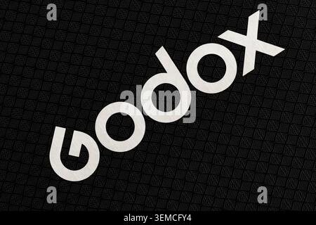 Lviv, Ukraine - May 31, 2026: Godox white logo printed on black textured nylon fabric equipment bag Stock Photo