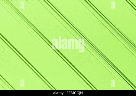 Green wooden slat texture background with diagonal lines. Painted surface pattern and decorative material backdrop for design projects. Stock Photo