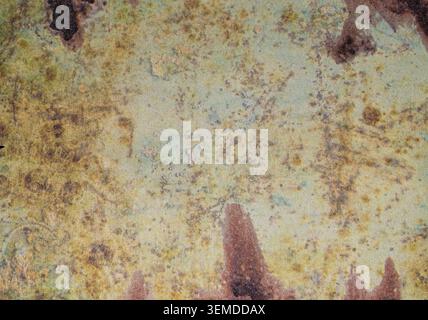 Muted green and beige texture paper background with weathered markings and subtle distressed details. Stock Photo