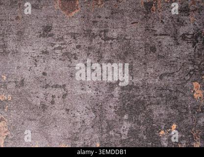Dark gray texture paper background with subtle distressed markings and weathered surface details. Stock Photo