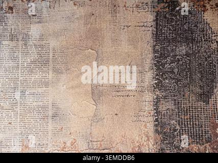 Vintage collage paper texture featuring newspaper print, handwritten script, and distressed layered elements. Stock Photo