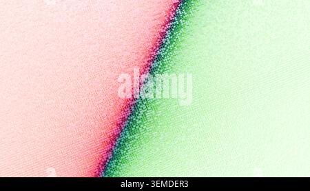 Colorful abstract background with soft pink to green gradient, subtle halftone dots and grainy texture. Modern digital backdrop ideal for posters, bra Stock Photo
