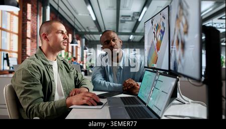 Young HVAC Engineer Working On Laptop To Calculate Thermal Load. Stock Photo