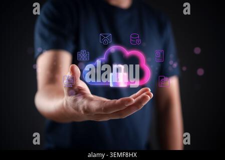 Man holding glowing neon cloud security icon with padlock. Cybersecurity, data privacy, and firewall protection concept. Secure cloud storage technolo Stock Photo