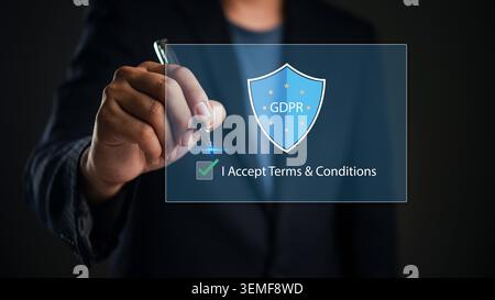 Businessman touching virtual screen with GDPR shield icon and checkbox. Concept of General Data Protection Regulation, data privacy compliance, cyber Stock Photo