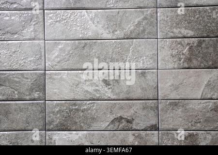 Grey Granite Look Porcelain Cladding Tiles with Relief Surface Detail Stock Photo