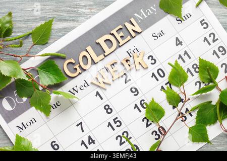 Golden Week. May 2024 monthly desk calendar. Green Day Stock Photo