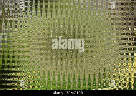 Abstract green gold kaleidoscope pattern with concentric oval circles repeating geometric texture background for wallpaper poster or graphic design Stock Photo