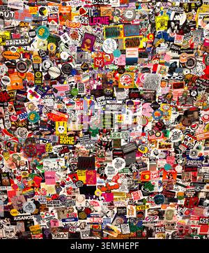 Dense collage of colorful stickers and pin buttons, urban street-style art, Germany Stock Photo