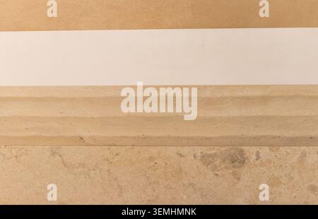 Travertine Tile Samples Display with Fluted Profile and Stone Borders Stock Photo